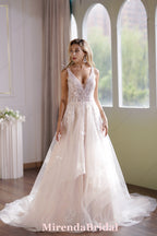 This Ball Gown Has A Sleeveless Bodice And A V-Neck Neckline