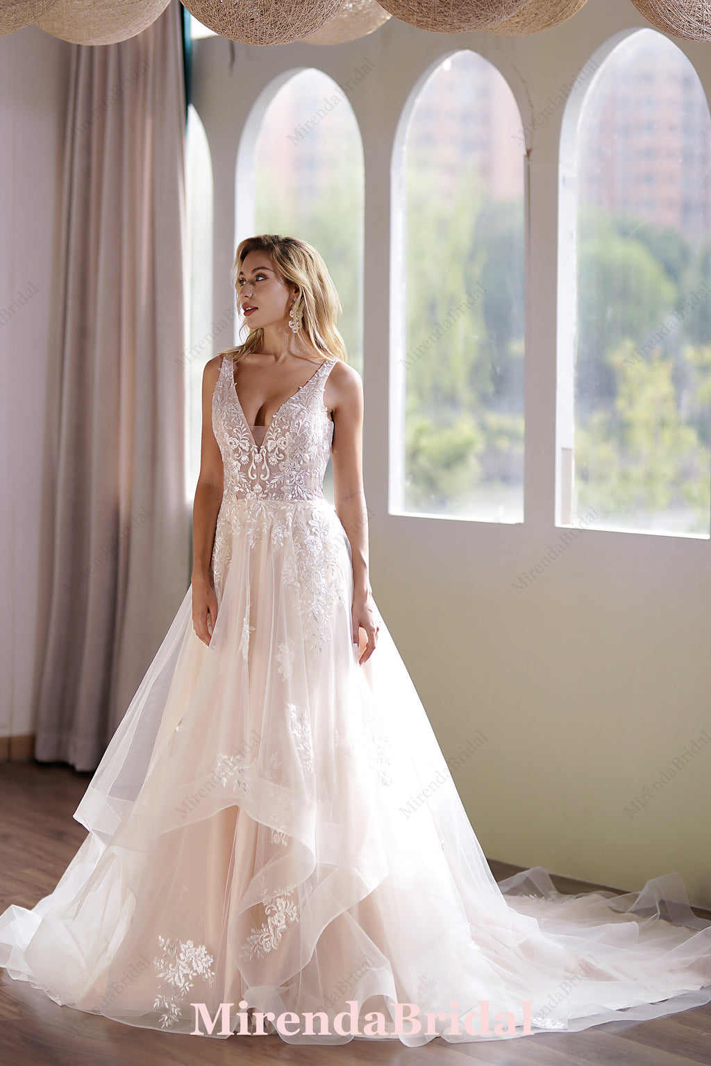 This Ball Gown Has A Sleeveless Bodice And A V-Neck Neckline