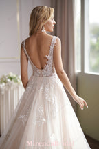 This Ball Gown Has A Sleeveless Bodice And A V-Neck Neckline