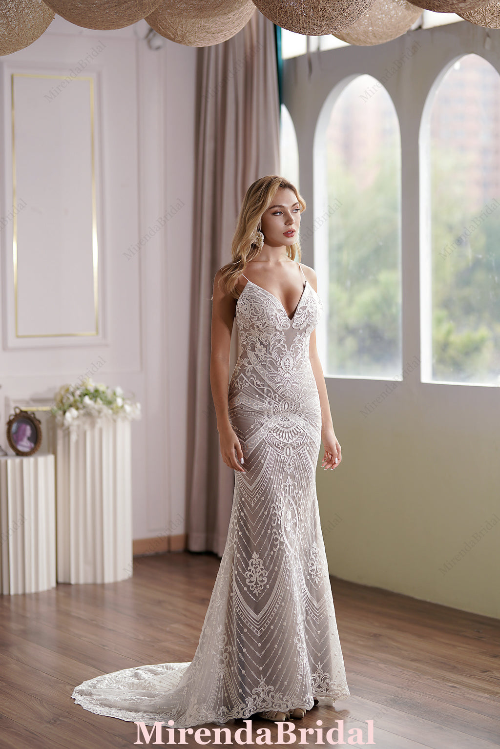 Glamorous Lace Fit-and-Flare Wedding Gown With Plunging Neckline