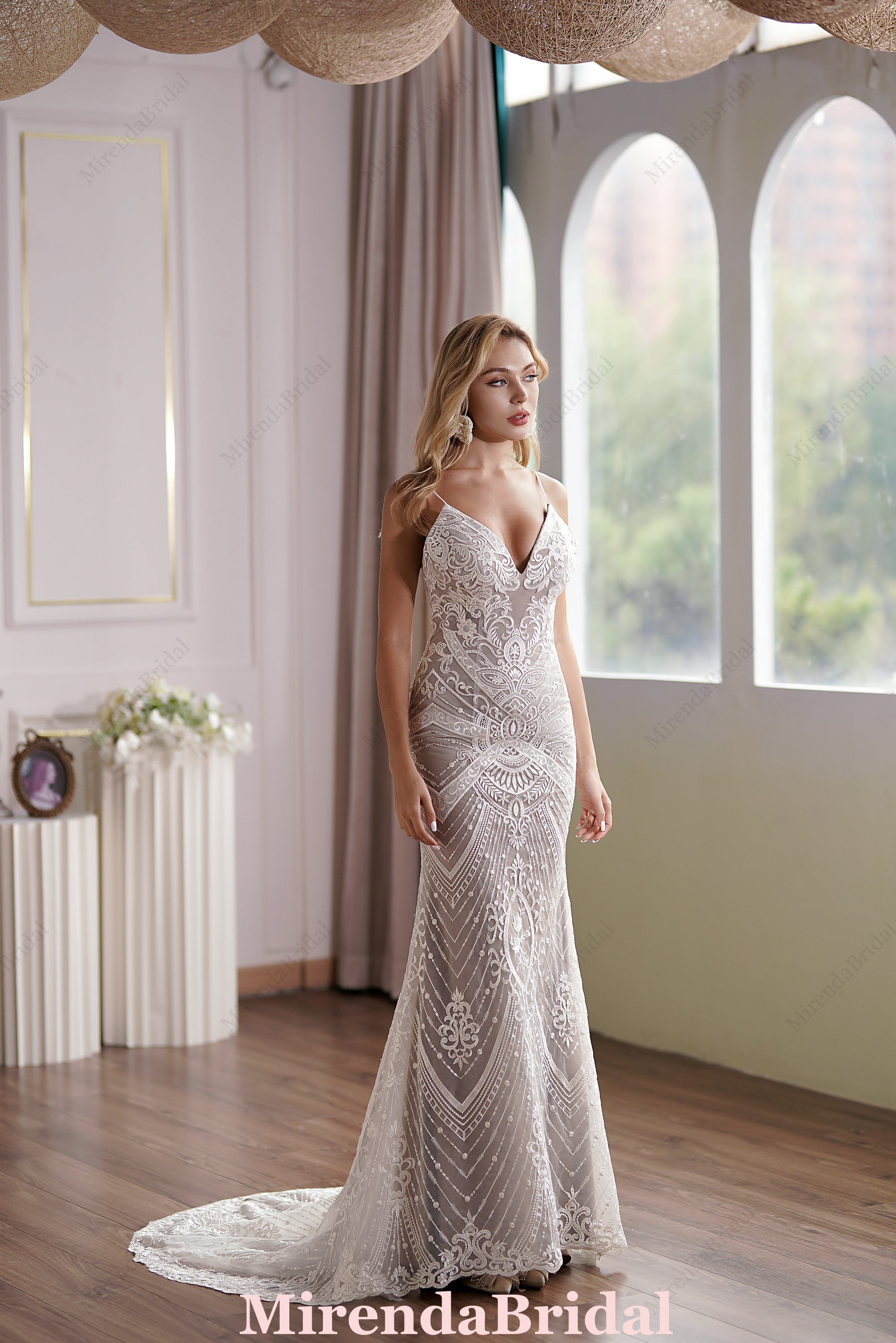 Glamorous Lace Fit-and-Flare Wedding Gown With Plunging Neckline