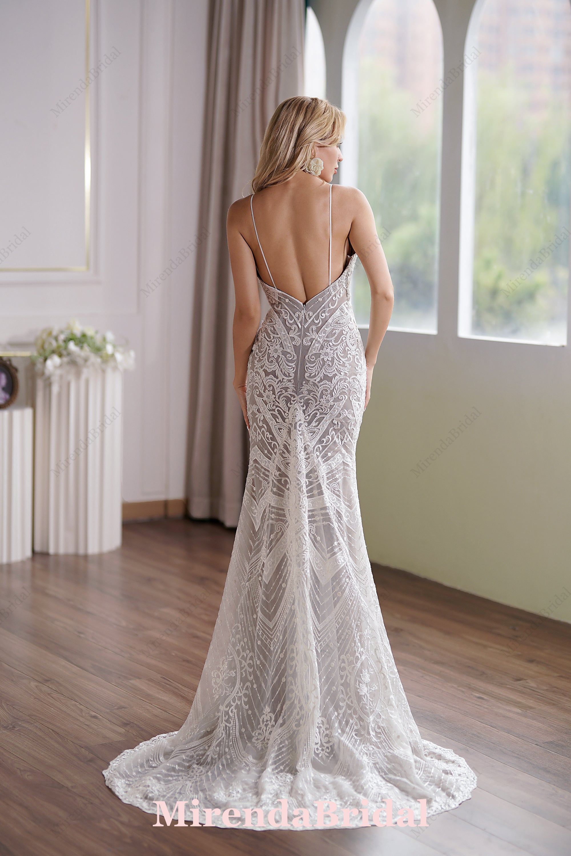 Glamorous Lace Fit-and-Flare Wedding Gown With Plunging Neckline