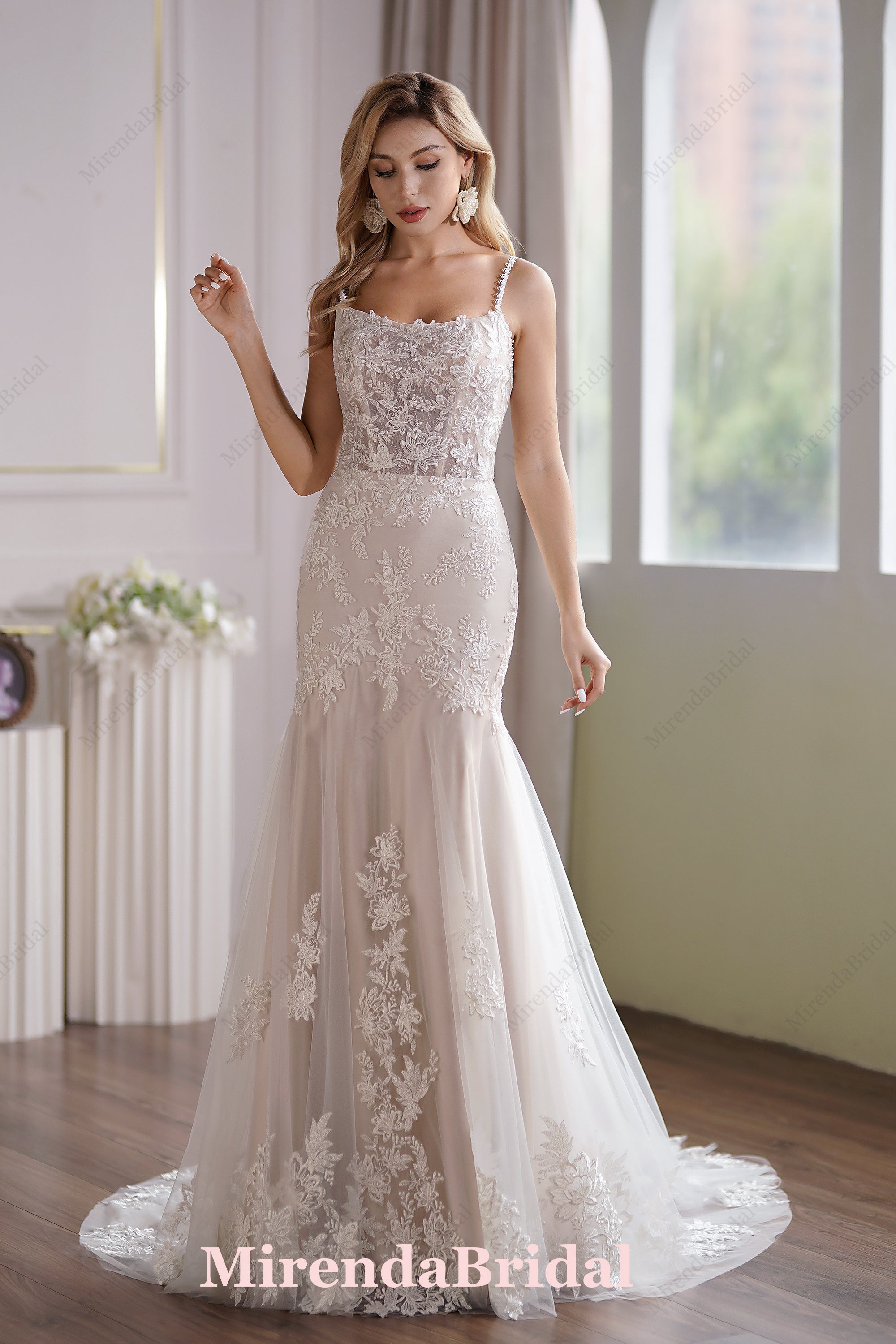 This Tulle Mermaid Bridal Gown Has A Subtle Scoop Neckline And A Sheer Back
