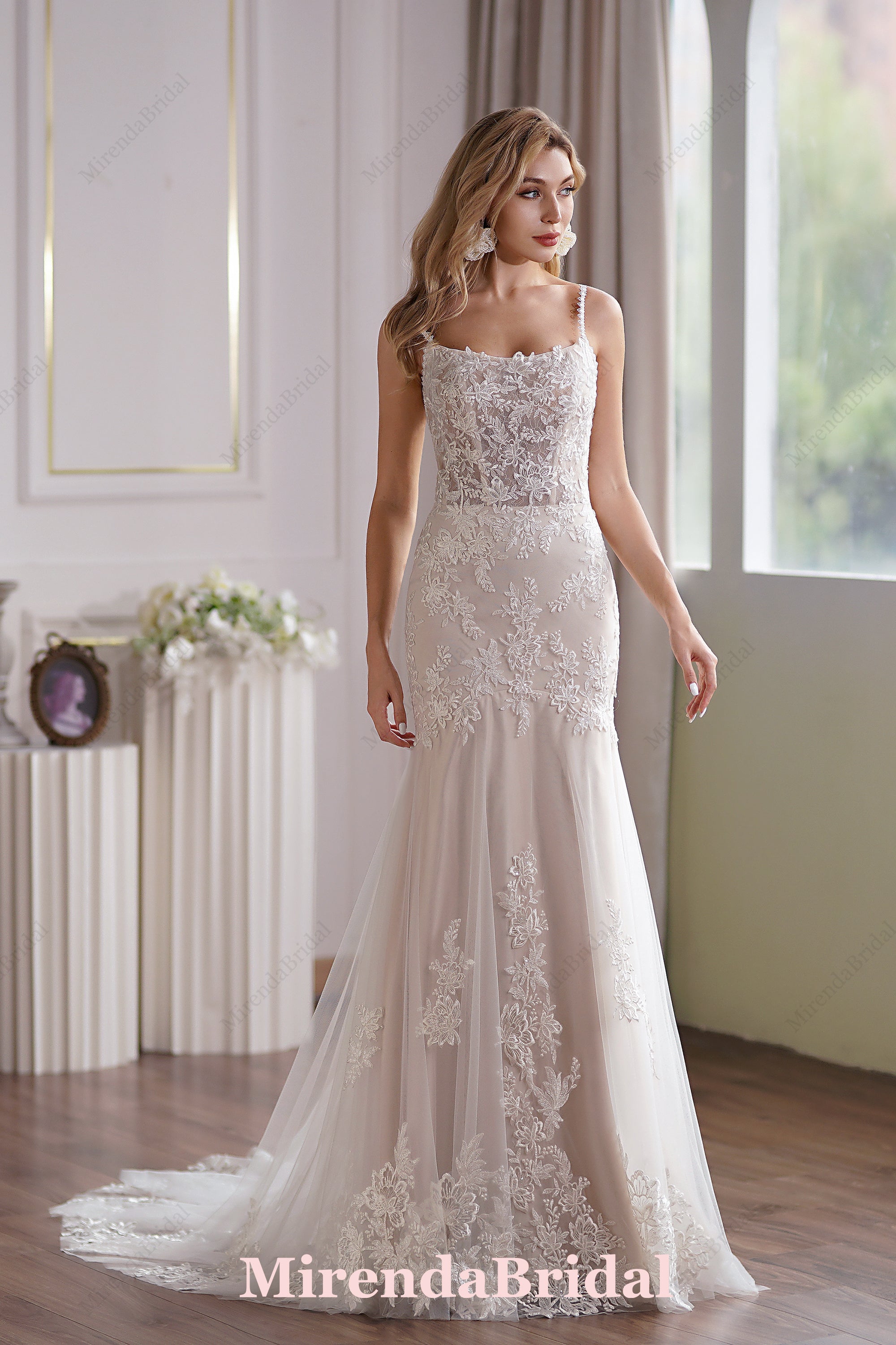 This Tulle Mermaid Bridal Gown Has A Subtle Scoop Neckline And A Sheer Back