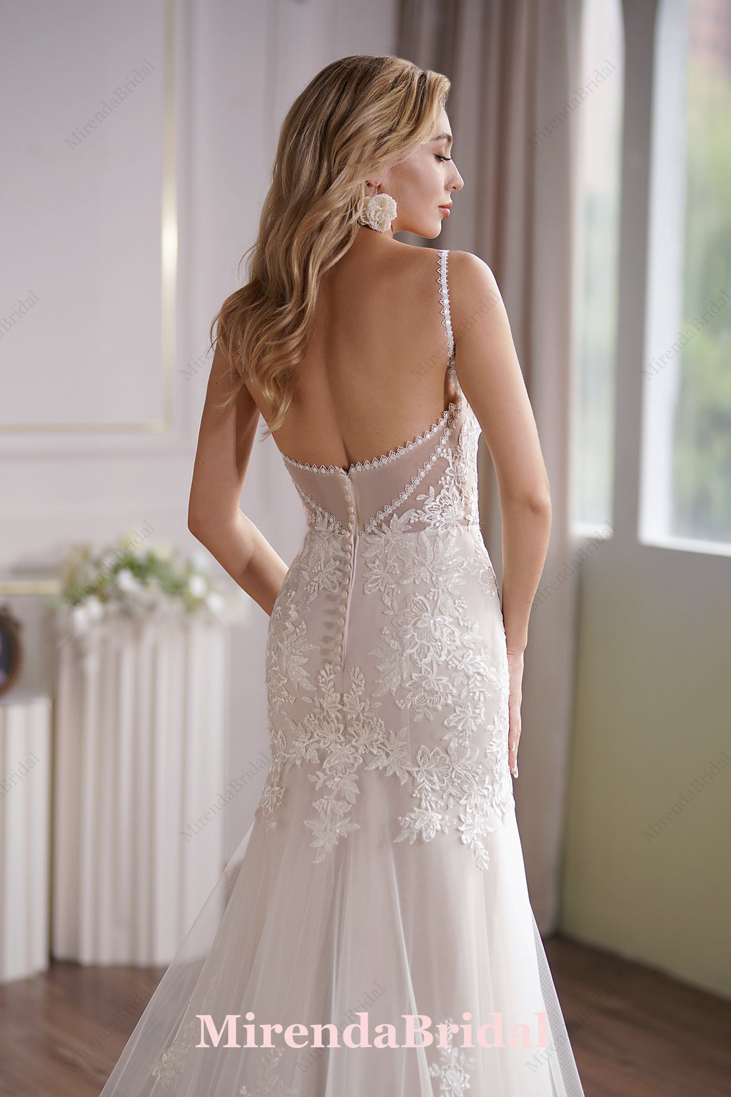 This Tulle Mermaid Bridal Gown Has A Subtle Scoop Neckline And A Sheer Back